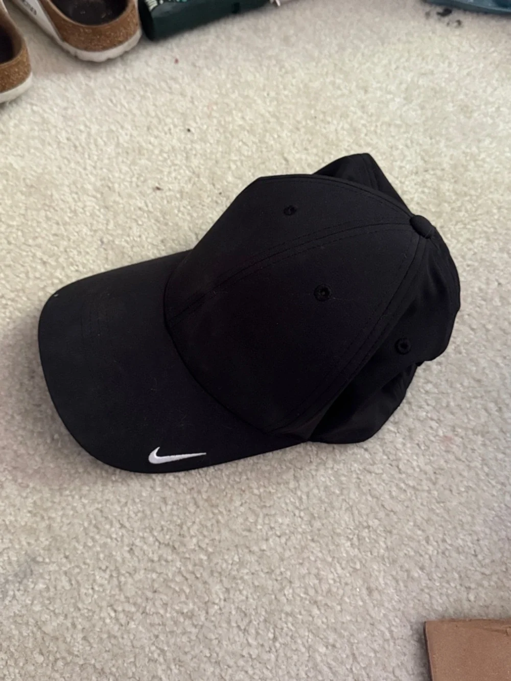 Nike Black Cap with White Swoosh Logo